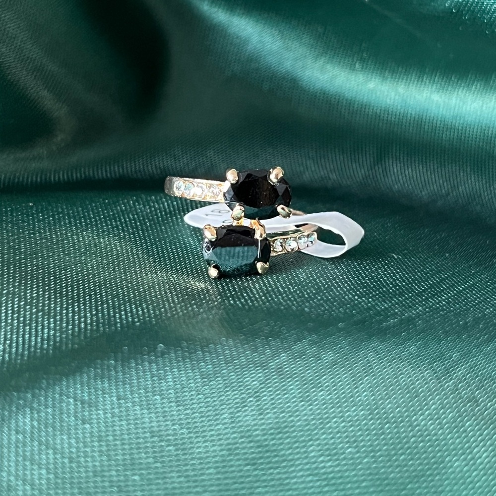 Gold Alloy Ring With Black And Clear Gems